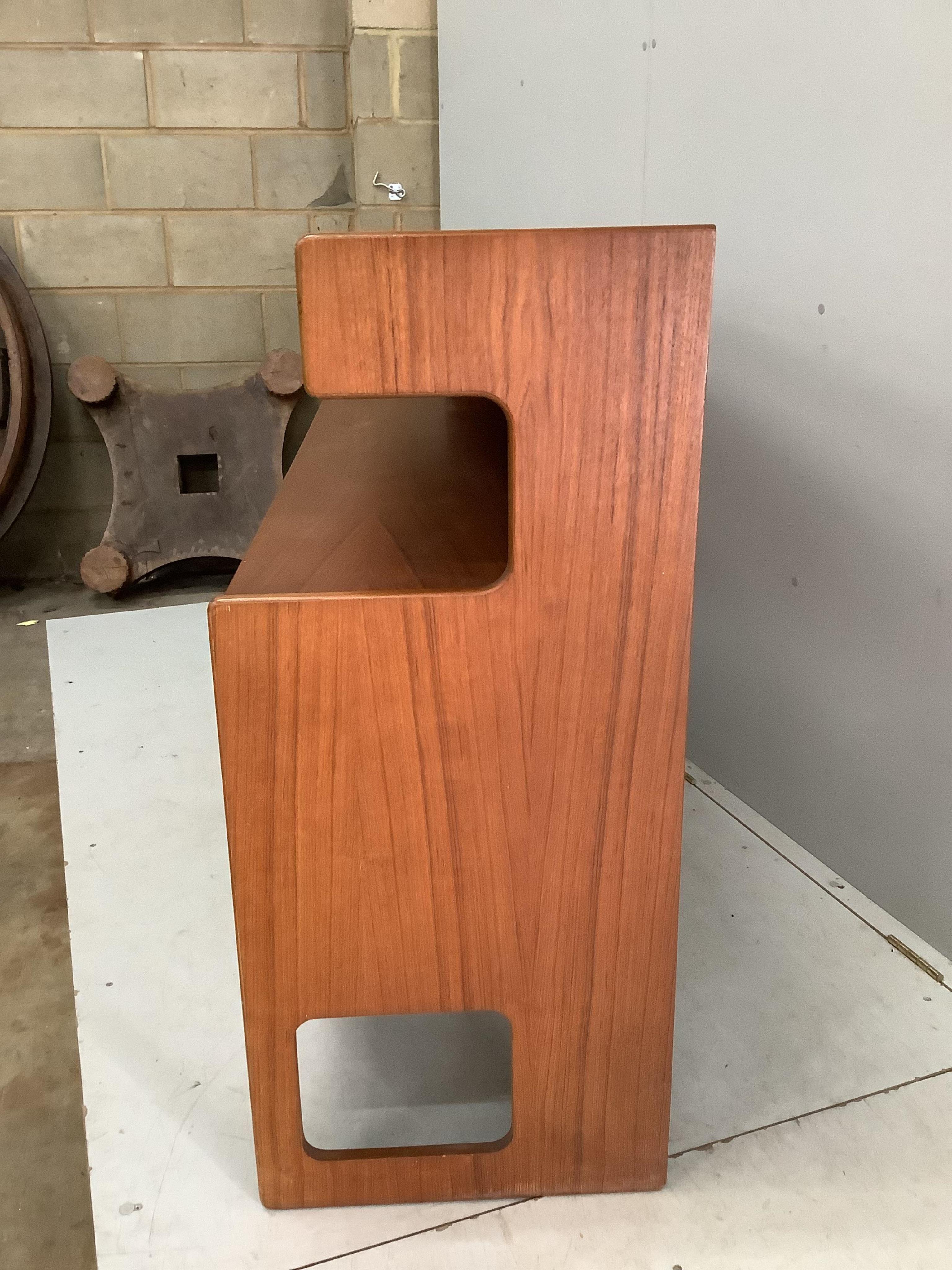 A mid century Danish style MacIntosh Forfar teak sideboard, width 170cm, depth 46cm, height 102cm together with a McIntosh teak extending dining table and four chairs teak sideboard, width 170cm, depth 46cm, height 102cm